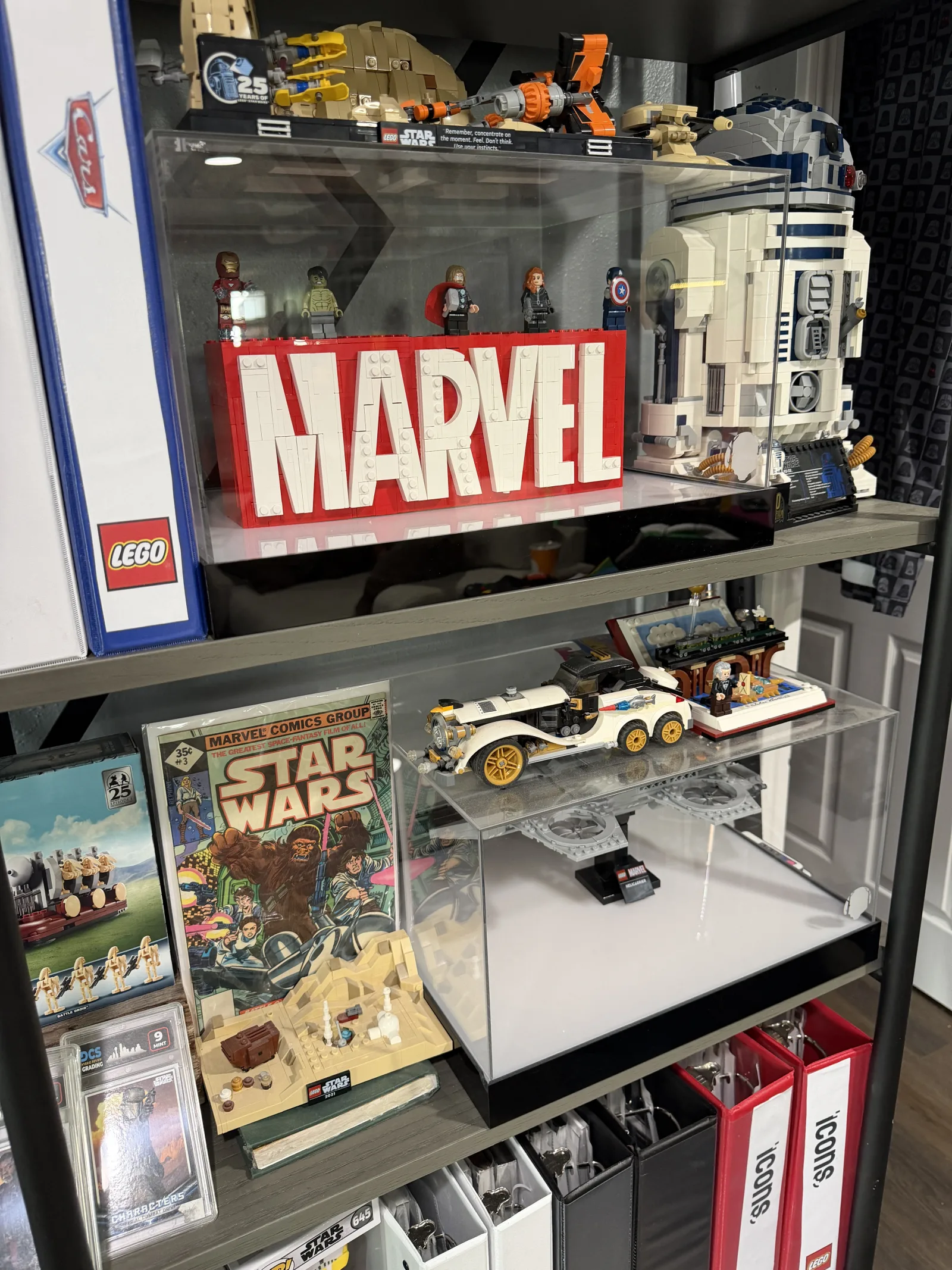 R2-D2 next to Marvel modular building