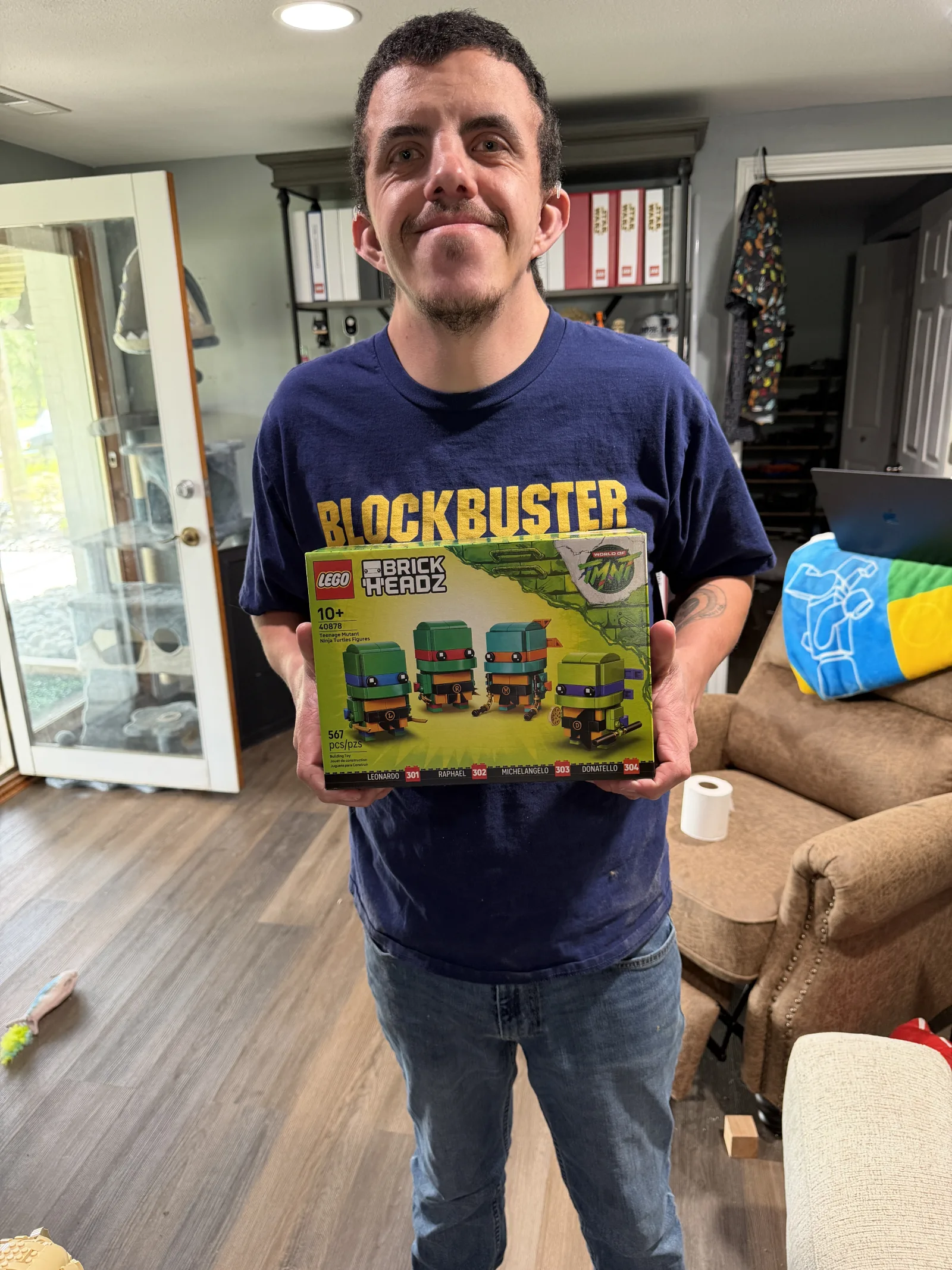 Tanner holding the Sesame Street Blockbuster set